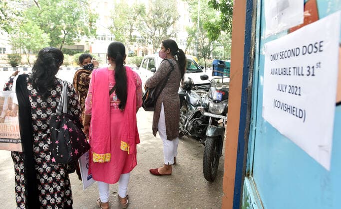 NEW DELHI, INDIA - JULY 23: Women teacher leave without taking vaccine because government stop the first dose from today at SKV School, Mata Sundari Road DDU Marg, on July 23, 2021 in New Delhi, India. (Photo by Sonu Mehta Hindustan Times) COVID-19 Vaccination Drive