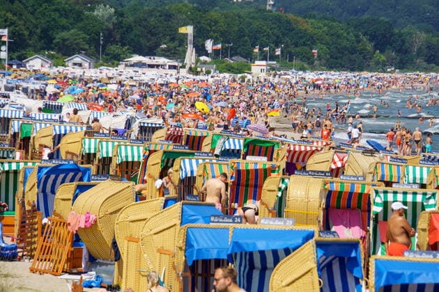 Filled beach high season at the Baltic Sea in summer 2021 beach at the Luebeck Bay in Niendorf tourism during the Corona Pandemic Filled beach high season at the Baltic Sea in summer 2021 beach at the Luebeck Bay in Niendorf tourism during the Corona Pandemic , Niendorf Schleswig Holstein Germany Beach