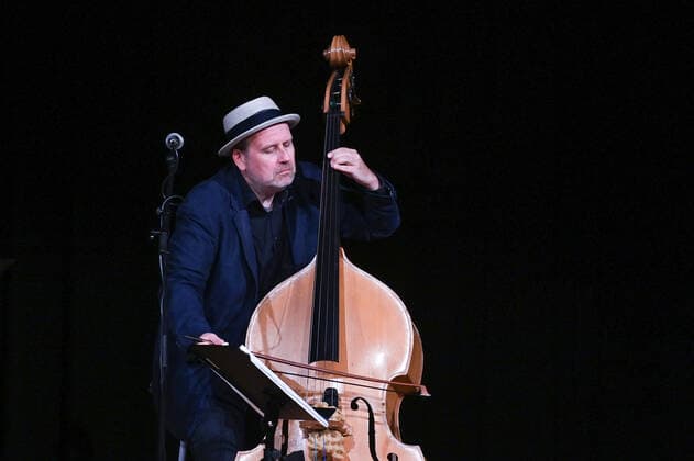 Concert of Georg Breinschmid bass player Benjamin Schmid violinist and Thomas Gansch trumpeter , in the context of the Salzkammergut Festwochen Gmunden, in the Kongresshaus Toskana in Gmunden , on 24 07 21 The picture shows the bass player Georg Breinschmid 2021 Concert of Georg Breinschm