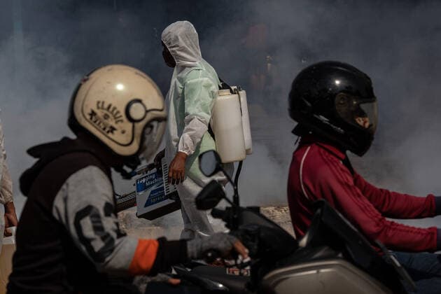 July 26, 2021, Tangerang Selatan, Banten, Indonesia: South Tangerang, BSD, Banten, Indonesia, July 26, 2021: Officers conduct fogging to eradicate dengue fever mosquitoes in order to prevent dengue fever cases in South Tangerang, Banten, Indonesia. Apart from being in a severe state of being attacked by the COVID-19 pandemic, Indonesia is also under threat of a dengue fever outbreak that always occurs every turn from summer to rainy season. Tangerang Selatan Indonesia - ZUMAh128 20210726_zap_h128_007 Copyright: xDonalxHusnix