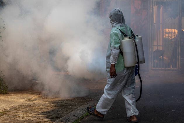 July 26, 2021, Tangerang Selatan, Banten, Indonesia: South Tangerang, BSD, Banten, Indonesia, July 26, 2021: Officers conduct fogging to eradicate dengue fever mosquitoes in order to prevent dengue fever cases in South Tangerang, Banten, Indonesia. Apart from being in a severe state of being attacked by the COVID-19 pandemic, Indonesia is also under threat of a dengue fever outbreak that always occurs every turn from summer to rainy season. Tangerang Selatan Indonesia - ZUMAh128 20210726_zap_h128_006 Copyright: xDonalxHusnix