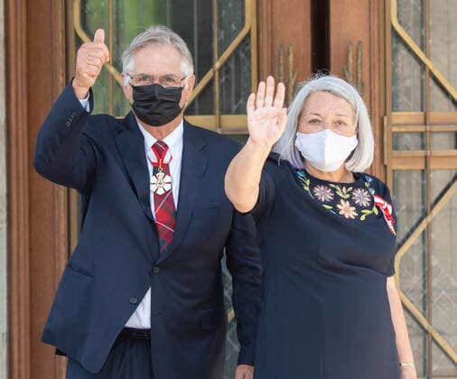 July 26, 2021, Ottawa, on, Canada: Governor General Mary Simon and her husband Whit Fraser wave before entering Rideau Hall, Monday, July 26, 2021 in Ottawa. Ottawa Canada  - ZUMAc35_ 20210726_zaf_c35_119 Copyright: xRyanxRemiorzx