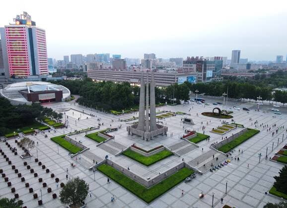 (210727) -- TANGSHAN, July 27, 2021 -- Aerial photo taken on July 26, 2021 shows the Tangshan quake monument in Tangshan City, north China s Hebei Province. Tangshan City in north China s Hebei Province, leaning against the Yanshan Mountains, facing the Bohai Sea, and abutting Beijing and Tianjin, has worked hard to rebuild itself since that tragic earthquake in 1976. In the early hours of July 28, 1976, one of the deadliest earthquakes of the 20th century razed the city to the ground, killing more than 240,000 people and injuring another 160,000. ) CHINA-HEBEI-TANGSHAN-AERIAL VIEW(CN) JinxHaoyuan 