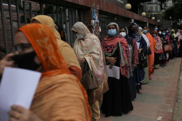July 28, 2021, Dhaka, Bangladesh: People stand in a queue as they wait for a Covid -19 coronavirus vaccine in front of a hospital in Dhaka. Dhaka Bangladesh - ZUMAh143 20210728_zap_h143_001 Copyright: xMDxMehedixHasanx