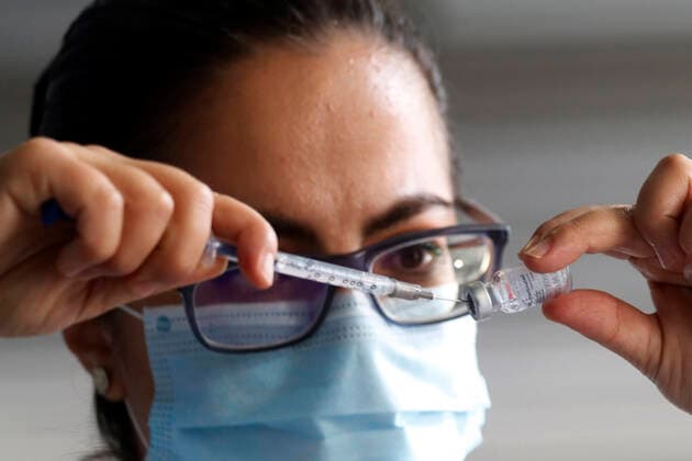 Youths Receive Sputnik V Vaccine Against Covid-19 MEXICO CITY, MEXICO - JULY 28: A Health worker, prepares a Sputnik V dose inside at the Palacio de los Deportes during the mass vaccination against Covid 19 for people aged 18 on July 28, 2021 in Mexico City, Mexico. Copyright: xLuisxBarronx EYEPIXGROUP_LB_28072021_11076