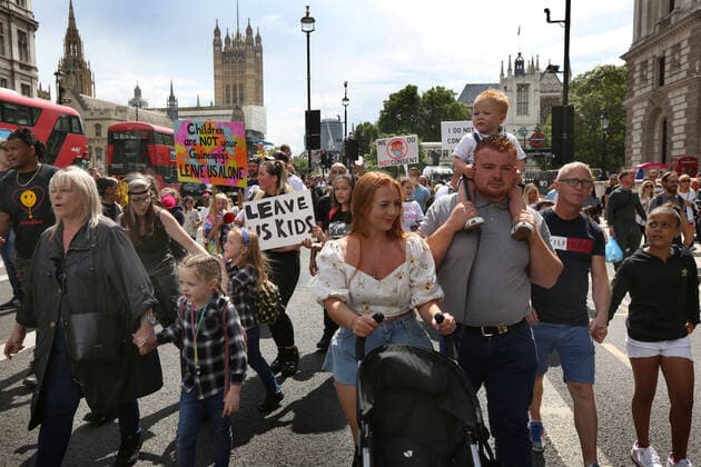 July 31, 2021, London, United Kingdom: Parents and children hold placards during the demonstration..Children and their parents protest in Central London against continued Covid-19 restrictions and vaccination of children. London United Kingdom - ZUMAs197 20210731_zaa_s197_263 Copyright: xMartinxPopex