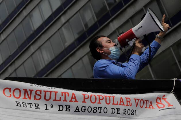 March In Favor Of The First Popular Consultation In Mexico Ends In Riots A person demonstrates in the streets of the Zocalo of Mexico City, to promote the First Popular Consultation to be held this Sunday August 1 during the health emergency by COVID-19 and the orange epidemiological traffic light in the capital, where citizens will be asked whether or not they agree with the possibility of opening criminal proceedings against past rulers. Mexico City Mexico vieyra-notitle210731_npy88  Copyright: xGerardoxVieyrax