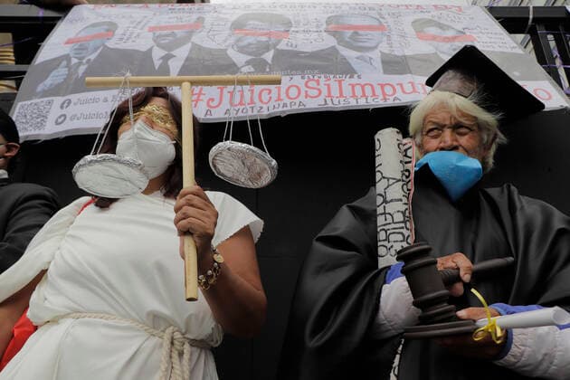 March In Favor Of The First Popular Consultation In Mexico Ends In Riots A woman in a disguise alluding to justice and other people accompanying her, marched in the streets of the Zocalo in Mexico City, to promote the First Popular Consultation to be held this Sunday 1 August during the COVID-19 health emergency and the orange epidemiological traffic light in the capital, where citizens will be asked whether or not they agree with the possibility of opening criminal proceedings against those who governed in the past. Mexico City Mexico vieyra-notitle210731_npBXw  Copyright: xGerardoxVieyrax