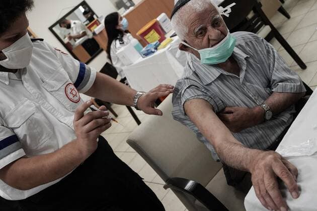 August 2, 2021, Jerusalem, Israel: Paramedics from Magen David Adom, serving as the Israeli Red Cross organization and leading EMS, deliver a 3rd BioNTech Pfizer booster vaccine to seniors at the Mishan Gonen Assisted Living Residence for the elderly. PM Bennett announced his goal of vaccinating all Israeli seniors, 60 and above, with a 3rd vaccine by the end of August 2021, in spite of the fact that a booster shot has not yet been approved by the US FDA. Jerusalem Israel - ZUMAa126 20210802_zap_a126_007 Copyright: xNirxAlonx