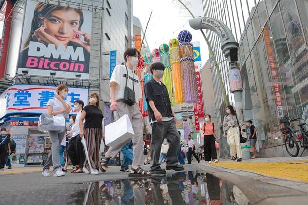 August 2, 2021, Tokyo, Japan: Pedestrians wearing face masks as a precaution against the spread of covid-19 walk underneath Tanabata decoration in Shibuya district, amid the covid-19 pandemic. Tokyo Japan - ZUMAs197 20210802_zab_s197_049 Copyright: xStanislavxKogikux