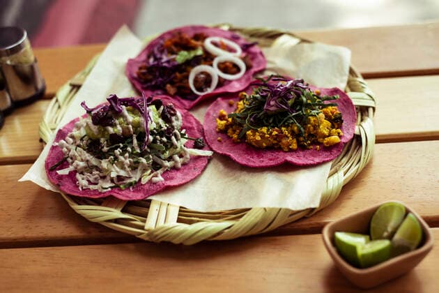 Pink healthy Mexican burritos on Mexico City summer street Mexico City, CDMX, Mexico CR_PIDODS210226-238628-01