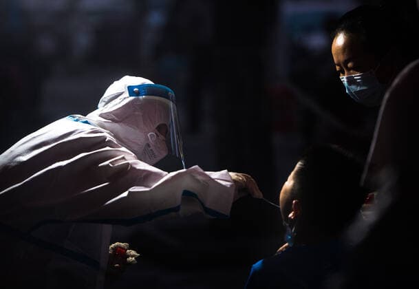 (210803) -- WUHAN, Aug. 3, 2021 -- A medical worker takes a swab sample from a resident for COVID-19 nucleic acid testing in Wuhan, central China s Hubei Province, Aug. 3, 2021. Wuhan City, capital of central China s Hubei Province, launched another citywide COVID-19 nucleic acid testing campaign on Tuesday, according to a press conference held by the provincial COVID-19 prevention and control headquarters. Wuhan, once hard-hit by COVID-19, identified new local clusters of cases on Monday when seven migrant workers at the Wuhan Economic & Technological Development Zone tested positive for the coronavirus. ) CHINA-HUBEI-WUHAN-COVID-19-TESTING (CN) XiaoxYijiu