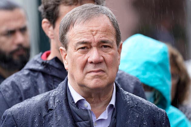 Prime Minister Laschet and Olaf Scholz visit Stolberg News, 03 08 2021, Stolberg, NRW Prime Minister Armin Laschet CDU very wet in the portrait in stroehmendem rain during his visit to the city of Stolberg near Aachen Stolberg North Rhine Westphalia Germany affected by the storm disaster