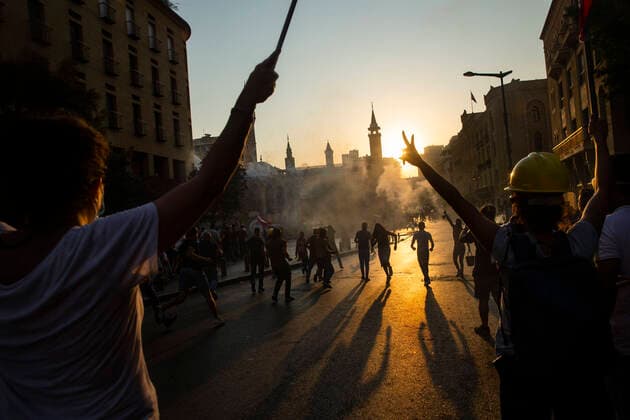 Bilder des Jahres 2021, News 08 August News Themen der Woche KW31 News Bilder des Tages August 4, 2021, Beirut, Beirut, Lebanon: Tear gas is visible as protesters walk toward Parliament during an anti-government demonstration on the one-year anniversary of the port explosion in Beirut, Lebanon on Aug. 4, 2021. The Lebanese Red Cross reported 10 people were wounded and transported to hospitals from clashes in Downtown Beirut, and 71 people injured were treated at the scene. The explosion, one of the largest non-nuclear blasts in human history, destroyed swathes of the city, killed at least 218 people, injured thousands and displaced an estimated 300,000 people. One year on and there has been zero accountability. Beirut Lebanon - ZUMAc244 20210804_zip_c244_010 Copyright: xDanielxCardex