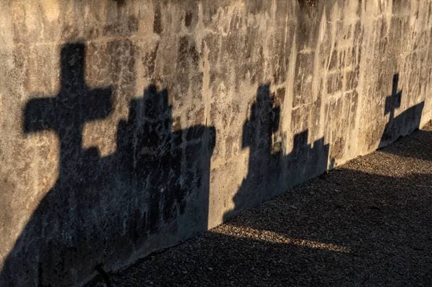 Silhouettes of crosses Eauze (south western France): shadows of crosses from the cemetery on the wall of the rural Church of Saint Amand Occitanie Pyrenees Mediterranee; Midi Pyrenees; Gers 32 Europe; Western Europe; France  Copyright: xGrimaultxE Andia.frx 384983