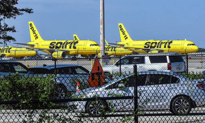 August 6, 2021, Orlando, Florida, United States: Spirit Airlines aircraft are seen parked at the end of a runway at Orlando International Airport on the sixth day the airline has cancelled hundreds of flights. .Approximately 2,000 flights were cancelled this week due to weather, staffing shortages, computer problems, and passenger volume. Orlando United States - ZUMAs197 20210806_zaa_s197_055 Copyright: xPaulxHennessyx