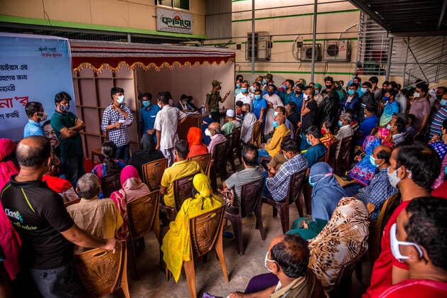 August 7, 2021, Barishal, Barishal, Bangladesh: People gathering to get themselves inoculated with the Moderna Covid-19 coronavirus vaccine during a mass vaccination camp starting today at Barishal City, Bangladesh on August 7, 2021. Barishal Bangladesh - ZUMAr337 20210807_zip_r337_008 Copyright: xMustasinurxRahmanxAlvix
