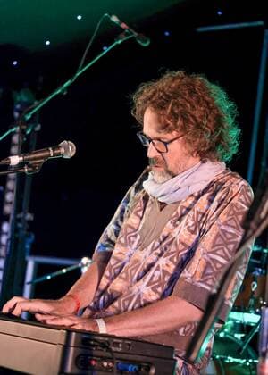 August 8, 2021, Wickham, Hampshire, United Kingdom: Irish singer, songwriter, actor and musician, Liam O Maonlai best known as the lead vocalist with Dublin band The Hothouse Flowers, playing keyboard while performing live on stage at Wickham Festival. Wickham United Kingdom - ZUMAs197 20210808_zaa_s197_219 Copyright: xDawnxFletcher-Parkx