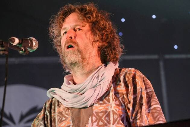 August 8, 2021, Wickham, Hampshire, United Kingdom: Irish singer, songwriter, actor and musician, Liam O Maonlai best known as the lead vocalist with Dublin band The Hothouse Flowers, playing keyboard while performing live on stage at Wickham Festival. Wickham United Kingdom - ZUMAs197 20210808_zaa_s197_223 Copyright: xDawnxFletcher-Parkx