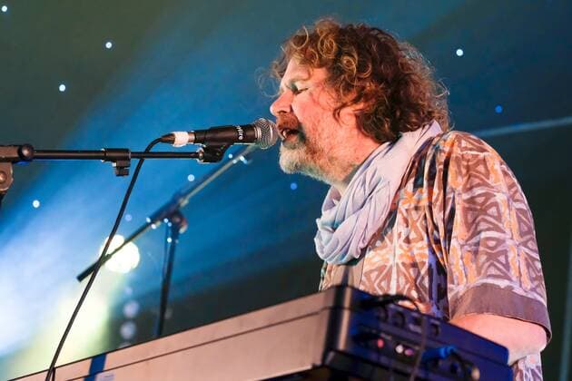August 8, 2021, Wickham, Hampshire, United Kingdom: Irish singer, songwriter, actor and musician, Liam O Maonlai best known as the lead vocalist with Dublin band The Hothouse Flowers, playing keyboard while performing live on stage at Wickham Festival. Wickham United Kingdom - ZUMAs197 20210808_zaa_s197_224 Copyright: xDawnxFletcher-Parkx