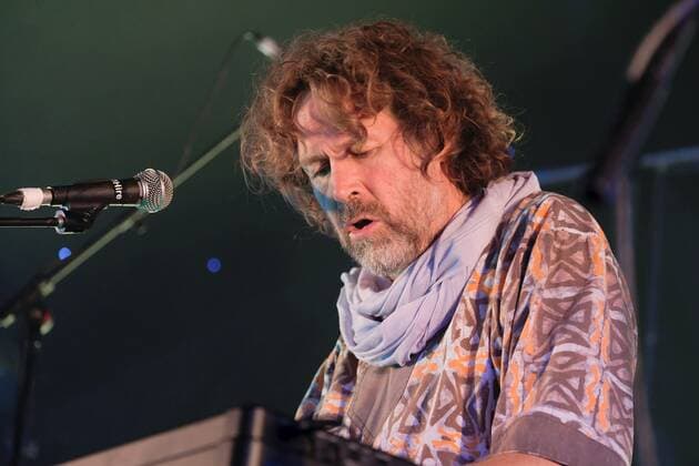 August 8, 2021, Wickham, Hampshire, United Kingdom: Irish singer, songwriter, actor and musician, Liam O Maonlai best known as the lead vocalist with Dublin band The Hothouse Flowers, playing keyboard while performing live on stage at Wickham Festival. Wickham United Kingdom - ZUMAs197 20210808_zaa_s197_225 Copyright: xDawnxFletcher-Parkx
