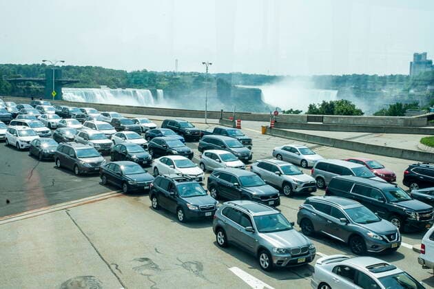 August 9, 2021, Niagara Falls, on, Canada: Cars wait on the Rainbow Bridge before crossing the border into Canada, in Niagara Falls, Ont. on Monday, August 9, 2021. American citizens and permanent residents are now allowed to enter Canada for non-essential purposes if they can provide proof that theyÃ¢â‚¬â ¢ve been fully vaccinated for at least 14 days. Niagara Falls Canada  - ZUMAc35_ 20210809_zaf_c35_063 Copyright: xEduardoxLimax