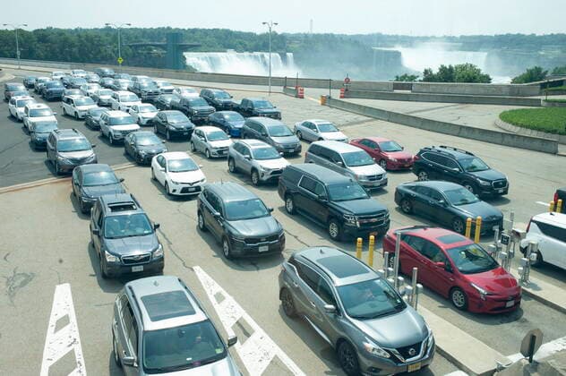 August 9, 2021, Niagara Falls, on, Canada: Cars wait on the Rainbow Bridge before crossing the border into Canada, in Niagara Falls, Ont. on Monday, August 9, 2021. American citizens and permanent residents are now allowed to enter Canada for non-essential purposes if they can provide proof that theyÃ¢â‚¬â ¢ve been fully vaccinated for at least 14 days. Niagara Falls Canada  - ZUMAc35_ 20210809_zaf_c35_064 Copyright: xEduardoxLimax