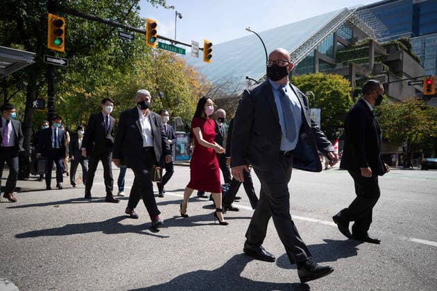 August 10, 2021, Vancouver, BC, Canada: Meng Wanzhou, centre, chief financial officer of Huawei, leaves B.C. Supreme Court during a break from her extradition hearing, in Vancouver, on Tuesday, August 10, 2021. Vancouver Canada - ZUMAc35_ 20210810_zaf_c35_032 Copyright: xDarrylxDyckx