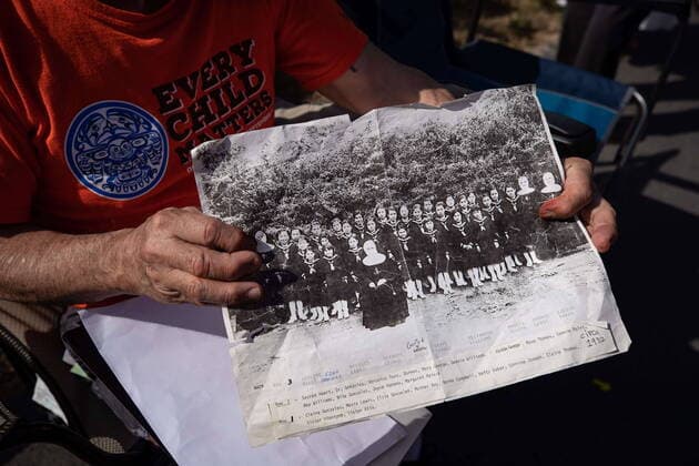 August 10, 2021, North Vancouver, BC, Canada: Willie Nahanee, 79, of the Squamish Nation, who attended the former St. Paul Indian Residential School for 10 years and the Kamloops Indian Residential School for one year, holds a photograph of the 1932 St. Paul girls class, in North Vancouver, on Tuesday, August 10, 2021. The Squamish Nation, together with the support of the Tsleil-Waututh and Musqueam First Nations and the Catholic Archdiocese will be launching an investigation into the former residential school. North Vancouver Canada - ZUMAc35_ 20210810_zaf_c35_062 Copyright: xDarrylxDyckx