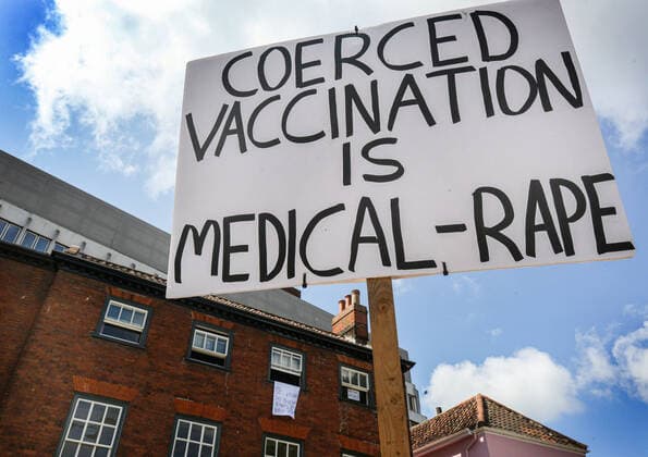 August 10, 2021, Norwich, United Kingdom: A protester holds an anti vaccination sign during the demonstration..Anti vax-passport protesters visit Norwich to highlight the discrimination they believe is taking place at The Murderers pub. The landlord Phil Cutter has introduced a new no jab, no entry rule that he says protects both his staff and customers. Norwich United Kingdom - ZUMAs197 20210810_zaa_s197_285 Copyright: xMartinxPopex