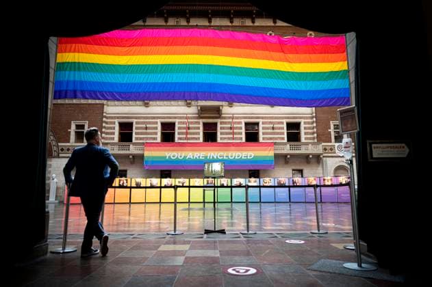 Large rainbow flag is set up in the Town Hall at Copenhagen City Hall, Wednesday 11 August 2021 The flag marks the opening of World Pride and Eurogames The flag itself was created by Gilbert Baker in 1994 where it was created in connection with the 25th anniversary of the Stonewall riots which took place in June 1969, Copenhagen Denmark  Copyright: RitzauxScanpix IdaxGuldbaekxArentsenx COP106 spdk20210811-102917-L