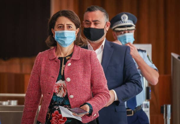GLADYS BEREJIKLIAN COVID19 PRESSER, NSW Premier Gladys Berejiklian (left) arrives for a press conference in Sydney, Sunday, August 15, 2021. NSW recorded 415 new locally acquired cases of COVID-19 with at least 66 infectious while in the community, as the entire state continues in lockdown. ( NO ARCHIVING, EDITORIAL USE ONLY, NO USE IN BOOKS WITHOUT CONSENT SYDNEY NSW AUSTRALIA  Copyright: xDAVIDxGRAYx 20210815001567013671