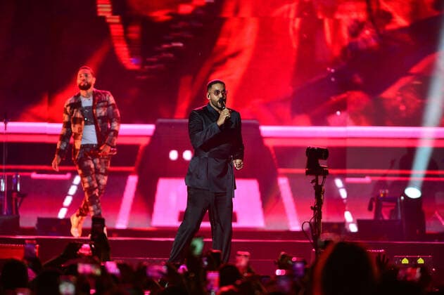 MIAMI GARDENS, FL - AUGUST 14: Henry Santos and Romeo Santos of Dominican-American Bachata Group Aventura performs on stage during the Inmortal Tour at Hard Rock Stadium on August 14, 2021 in Miami Gardens, Florida. Copyright: xmpi10x