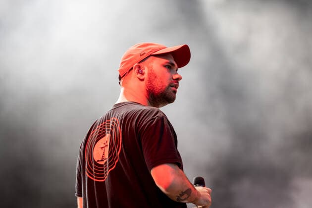 Rapper Koljah The Hip Hop Band Antilopen Gang with the Insolvenzverschleppung Tour on the Kunst Rasen Bonn, 15 08 2021 organized by E L Hartz Promotion GmbH Bonn Gronau NRW Germany