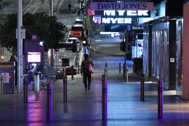 VICTORIA CORONAVIRUS COVID19, A person is seen walking along Bourke Street ahead of the curfew in Melbourne, Monday, August 16, 2021. Victorian Premier Daniel Andrews today announced a night curfew which came into effect at 11.59pm on Monday. ( NO ARCHIVING, EDITORIAL USE ONLY, NO USE IN BOOKS WITHOUT CONSENT MELBOURNE VIC AUSTRALIA  Copyright: xJAMESxROSSx 20210816001567369297