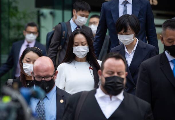 August 17, 2021, Vancouver, BC, Canada: Meng Wanzhou, centre left, chief financial officer of Huawei, leaves B.C. Supreme Court during a break from her extradition hearing, in Vancouver, on Tuesday, August 17, 2021. Vancouver Canada - ZUMAc35_ 20210817_zaf_c35_039 Copyright: xDarrylxDyckx