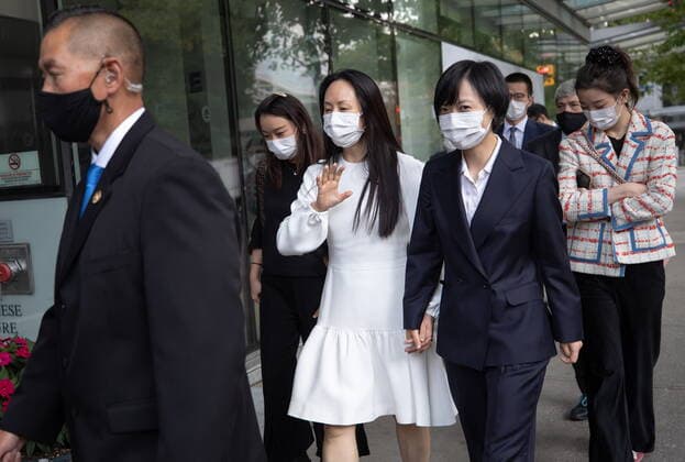 August 17, 2021, Vancouver, BC, Canada: Meng Wanzhou, centre, chief financial officer of Huawei, leaves B.C. Supreme Court during a break from her extradition hearing, in Vancouver, on Tuesday, August 17, 2021. Vancouver Canada - ZUMAc35_ 20210817_zaf_c35_047 Copyright: xDarrylxDyckx