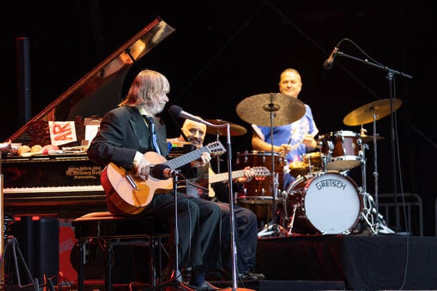 Helge Schneider with Sandro Giampietro, guitar and Thomas Alkier, drums Live performance of the entertainer and musician Helge Schneider with the program Die Wiederkehr des blaugrünen Smaragdkäfers at the Kunst Rasen Bonn, 17 08 2021 organized by E L Hartz Promotion GmbH Bonn Gronau NRW Germany