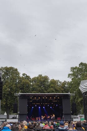 Swallow swarm over the concert area Live performance of the entertainer and musician Helge Schneider with the program The return of the blue-green emerald beetle on the art lawn Bonn, 17 08 2021 organized by E L Hartz Promotion GmbH Bonn Gronau NRW Germany