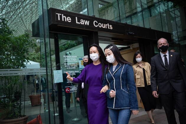 August 18, 2021, Vancouver, BC, Canada: Meng Wanzhou, front left, chief financial officer of Huawei, leaves B.C. Supreme Court during a break from her extradition hearing, in Vancouver, on Wednesday, August 18, 2021. Vancouver Canada - ZUMAc35_ 20210818_zaf_c35_048 Copyright: xDarrylxDyckx