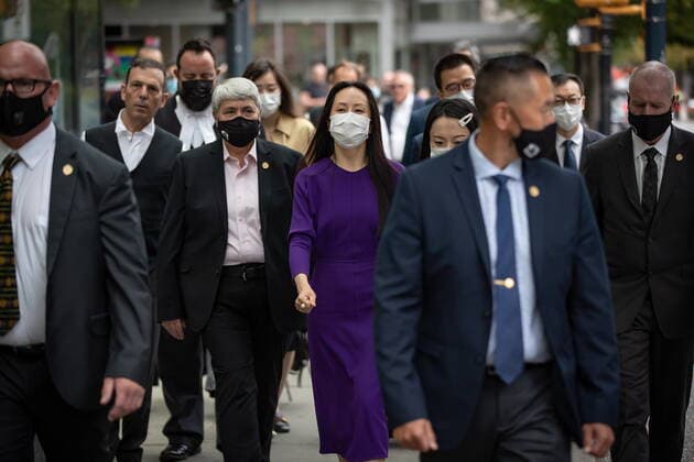August 18, 2021, Vancouver, BC, Canada: Meng Wanzhou, centre, chief financial officer of Huawei, leaves B.C. Supreme Court during a break from her extradition hearing, in Vancouver, on Wednesday, August 18, 2021. Vancouver Canada - ZUMAc35_ 20210818_zaf_c35_071 Copyright: xDarrylxDyckx