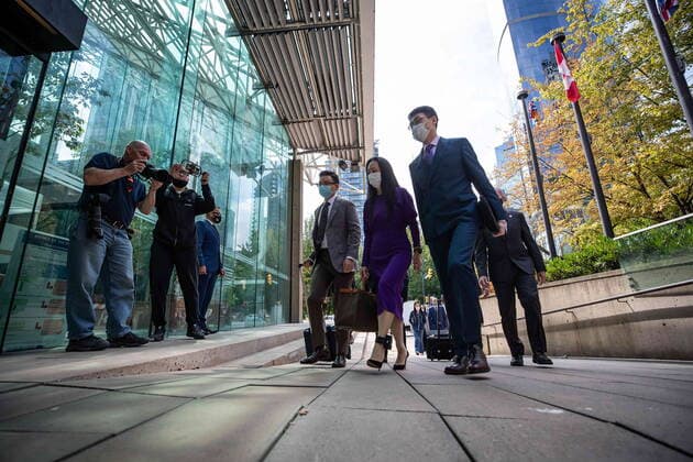 August 18, 2021, Vancouver, BC, Canada: Meng Wanzhou, second right, chief financial officer of Huawei, returns to B.C. Supreme Court after a break from her extradition hearing in Vancouver on Wednesday, August 18, 2021. Vancouver Canada  - ZUMAc35_ 20210818_zaf_c35_088 Copyright: xDarrylxDyckx