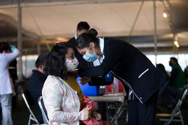 Coronavirus Vaccination In Mexico Free application of the first dose of the Pfizer vaccine against COVID-19, for people from 18 to 29 years old who live in the Xochimilco boroug, in Mexico City, Mexico, on August 19, 2021 Mexico City Mexico leyva-notitle210819_npST2  Copyright: xCristianxLeyvax