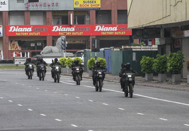 August 21, 2021, colombo, Sri Lanka: Army soldiers on motorbikes patrol along a deserted street during a nationwide 10-days lockdown imposed to curb the spread of Covid-19 coronavirus in Colombo, Sri Lanka on August 21, 2021. colombo Sri Lanka. - ZUMAd152 20210821_znp_d152_014 Copyright: xPradeepxDambaragex