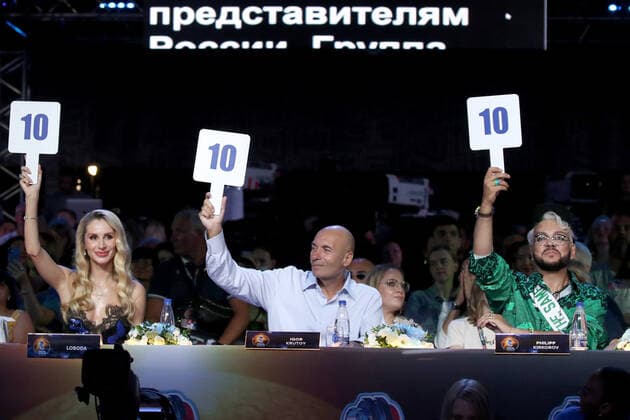 SOCHI, RUSSIA - AUGUST 21, 2021: Jury members, singer Svetlana Loboda, composer Igor Krutoy and singer Filipp Kirkorov (L-R) give points to contestants at the New Wave 2021 International Contest for Young Pop Singers. Vyacheslav Prokofyev TASS  TS10D3EA
