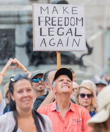August 21, 2021, Montreal, PQ, Canada: People attend a demonstration against measures put in place by the Quebec government to help curb the spread of COVID-19, in Montreal, Saturday, Aug. 21, 2021. Montreal Canada  - ZUMAc35_ 20210821_zaf_c35_033 Copyright: xGrahamxHughesx
