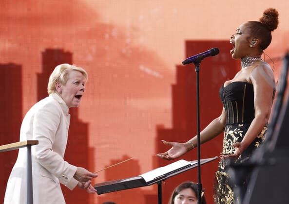 Marin Alsop and New York Philharmonic conducts while Jennifer Hudson performs at the We Love NYC: The Homecoming Concert In Central Park in New York City on Saturday, August 21, 2021. The Event ended abruptly when thunder storms and lightning related to Hurricane Henri moved into the area.  NYP20210821110 JohnxAngelillo