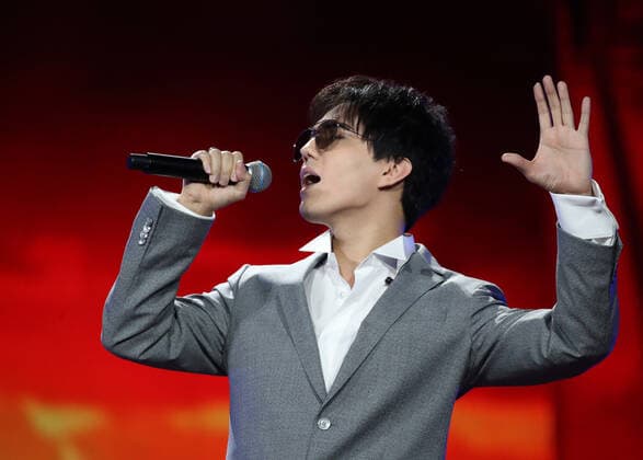 SOCHI, RUSSIA - AUGUST 22, 2021: Singer Dimash Kudaibergen performs at a concert given by jury members as part of the New Wave 2021 International Competition of Young Pop Music Performers. Vyacheslav Prokofyev TASS  TS10D5CB