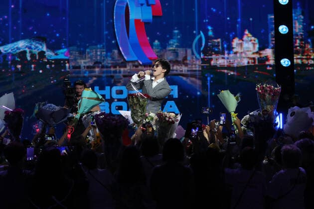 SOCHI, RUSSIA - AUGUST 22, 2021: Singer Dimash Kudaibergen performs at a concert given by jury members as part of the New Wave 2021 International Competition of Young Pop Music Performers. Vyacheslav Prokofyev TASS  TS10D5DD