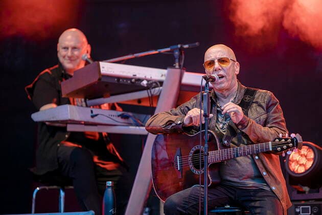 Manfred Hennig keyboards and Toni Krahl vocals, guitar L R of the group CITY founded in 1972 in East Berlin GDR during the Candlelight Open Air rock concert live in Coswig